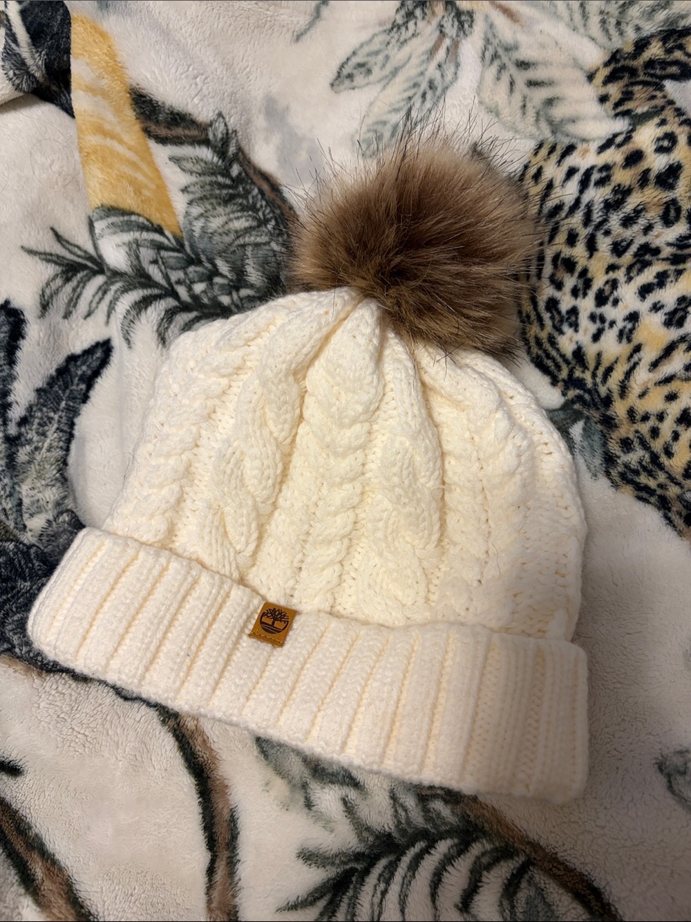 Timberland Cream Cable-Knit Beanie with Brown Faux Fur Pom